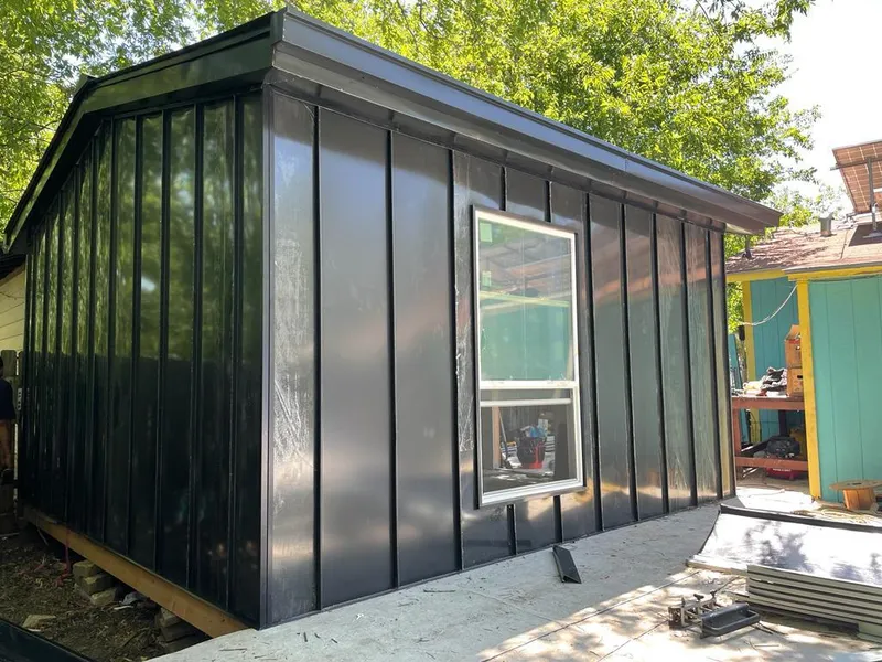 Black standing seam metal wall panels for Metal Roof Installation in Manville